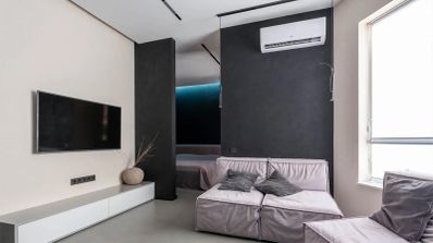 un aire acondicionado moderno mostrando el modo calor activado