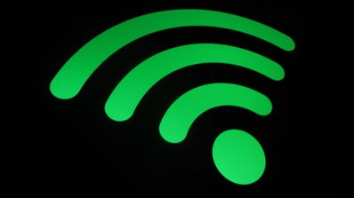 Símbolo del Wi-Fi de color verde, sobre un fondo negro