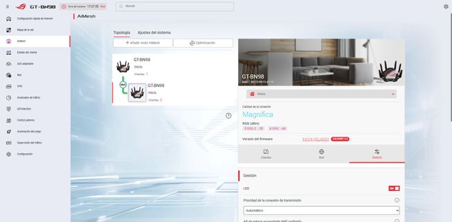 Interfaz web de ASUSWRT mostrando la configuración de red AiMesh con dos routers ASUS GT-BN98 conectados.