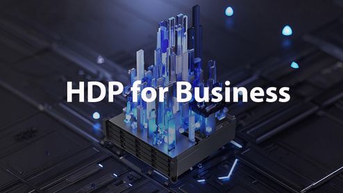 Ilustración conceptual de una estructura de cristal azul iluminada sobre una placa base con el texto HDP for Business.