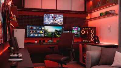 Habitación tipo setup gaming con varios monitores, torre de PC iluminada y consola, en un entorno con luces LED rojas.