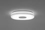 Lámpara de techo circular encendida con luz blanca y difusor central.