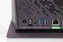 Detalle de los puertos traseros del router ASUS RT-AX86U que incluye tomas USB, botón de encendido y puertos Ethernet.
