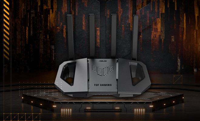 Router ASUS TUF-BE3600 con cuatro antenas externas sobre una plataforma hexagonal en un entorno de estética gaming.