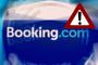 Logotipo de Booking.com con un icono de advertencia triangular de color rojo superpuesto.