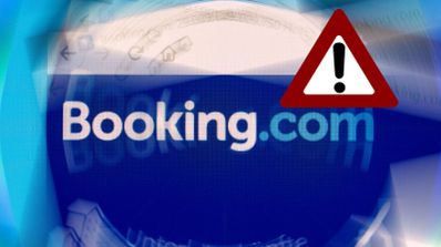 Logotipo de Booking.com con un icono de advertencia triangular de color rojo superpuesto.