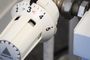 Primer plano de una válvula termostática de radiador Danfoss con el dial ajustado en el número tres.