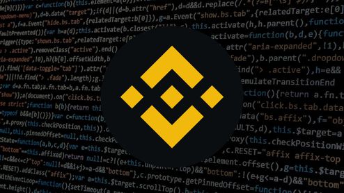 Logotipo de Binance sobre un fondo de líneas de código de programación en color sobre negro.