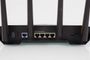 Panel posterior del router ASUS TUF-AX4200 mostrando puertos Ethernet, WAN, USB y tomas de corriente.